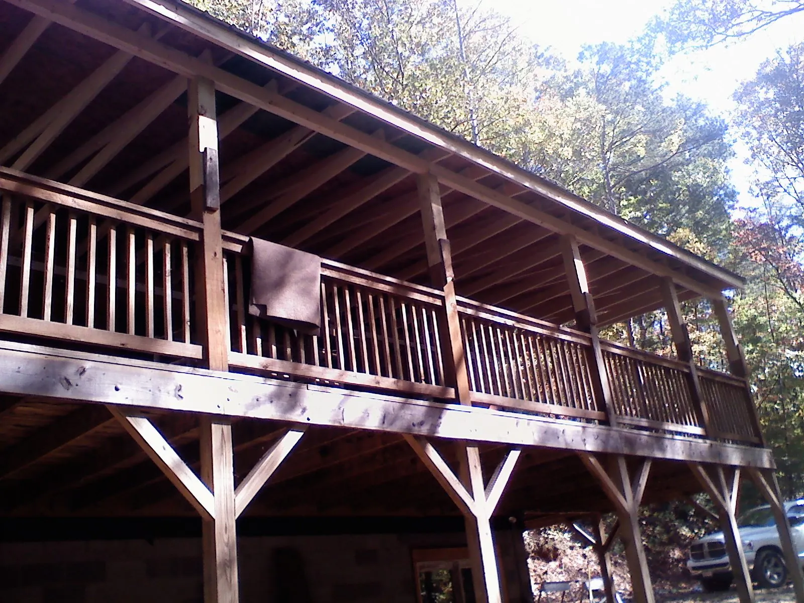 Timber framing under a new elevated porch and deck — Roof Leak Repair in Martin City by Roofing Brothers